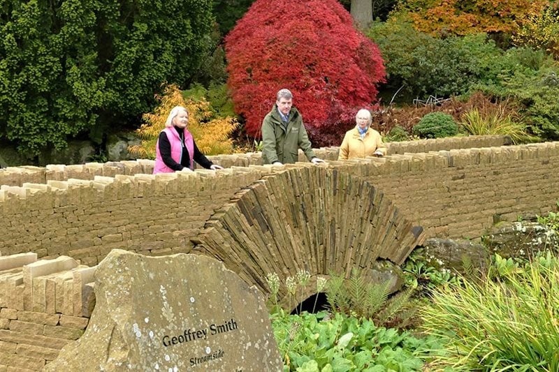 Members of Friends of Harlow Carr on Friendship Bridge with Curator Paul Cook