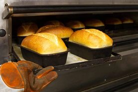 Bread coming out of the oven at Wisley