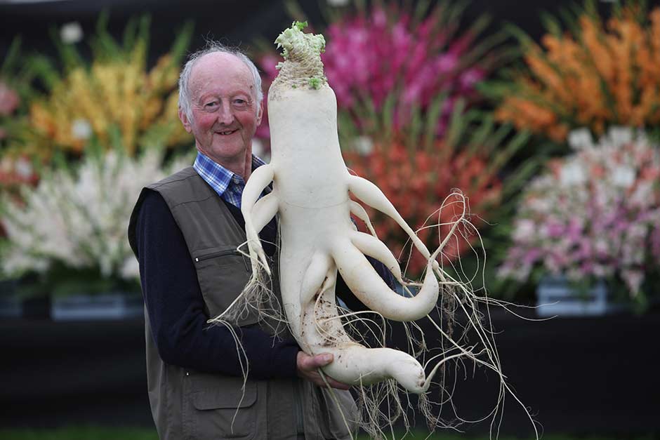 Man with large vegetable