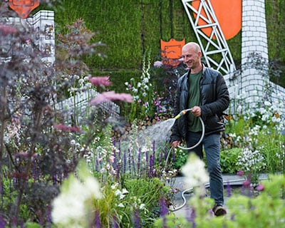 Nigel Dunnett watering garden at show