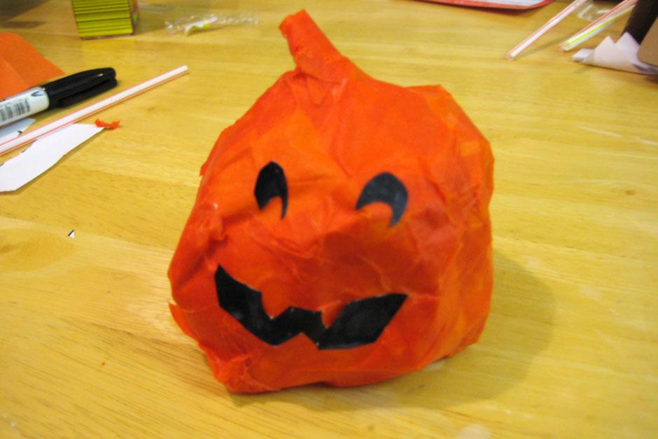 Make a paper mache pumpkin