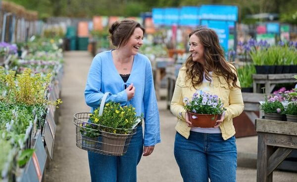 person shopping for small plant from the shop