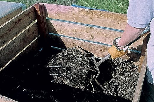 turning the compost bin