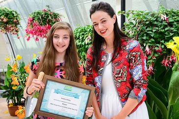 RHS Young School Gardener of the Year 2015 Heather Birkby receives her award from Frances Tophill