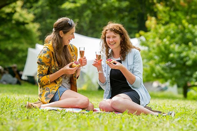 Ladies enjoying a snack with a glass of fizzy