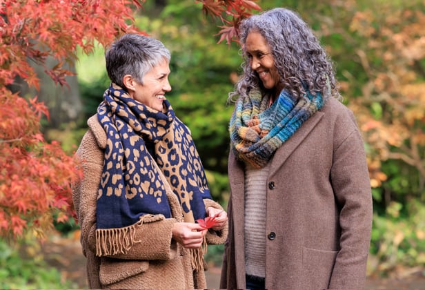 Photo of two women enjoying an RHS garden