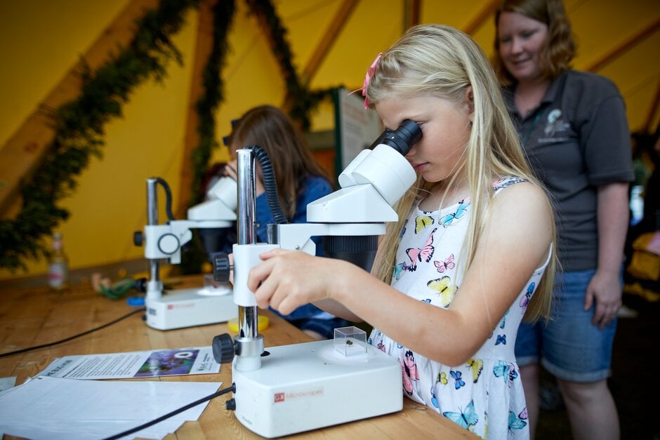 Girl using a microscope