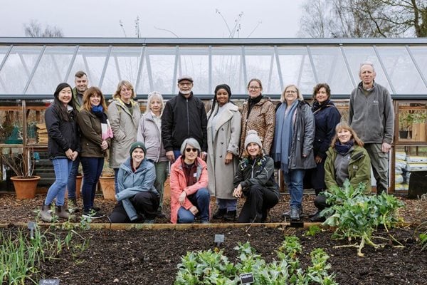 Two people having fun gardening