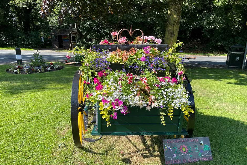 Churchtown in Bloom’s cart filled with eye-catching planting
