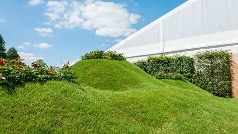 Mounds are covered in rolls of turf supplied by Rowlawn and watered throughout the show to keep it looking green and fresh.
