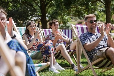 Visitors enjoy live music in the garden