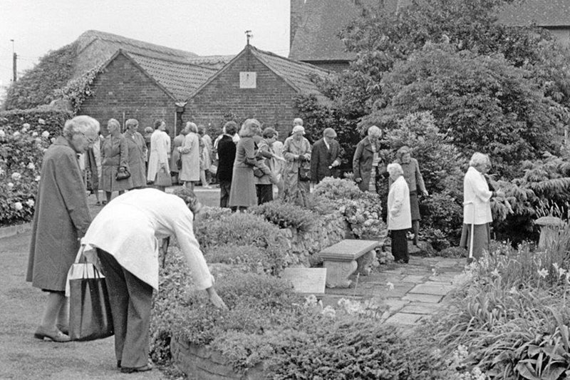 A collection of photos showing an open day in the 1970s. Notice the Sunday Best clothing.