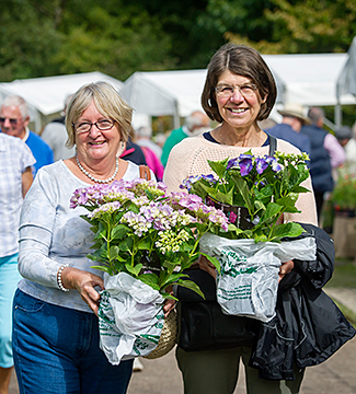 Visitors with their hydrangea purchases