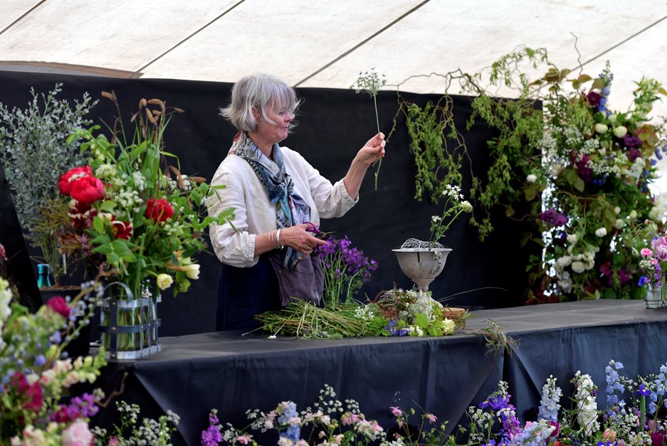 Woman gives floral demonstration