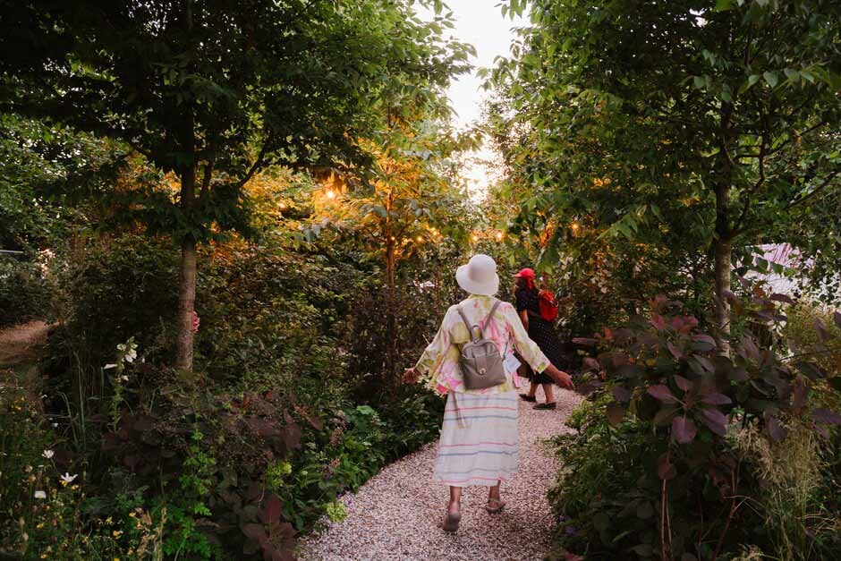 Visitors walk through the Forest Bathing Garden at RHS Hampton Court 2022