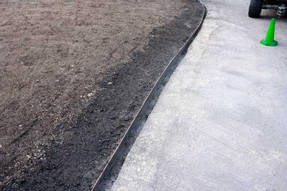 Metal edging replaces the old stone kerb