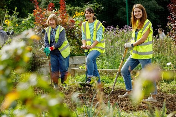 Two people having fun gardening