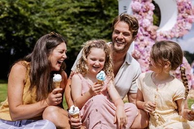 Family enjoys ice creams at the show