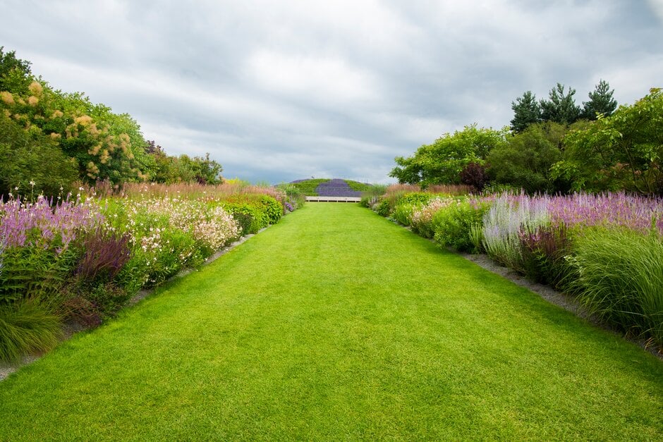 These lawn edges at RHS Garden Wisley help keep gravel mulch in the borders