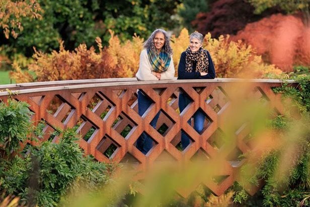 Photo of two women enjoying an RHS garden