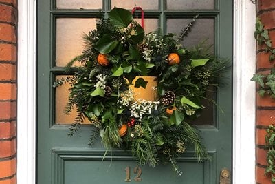 Textural greens with splashes of orange and white