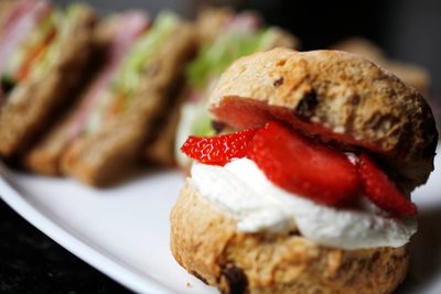 Scone with strawberries and cream