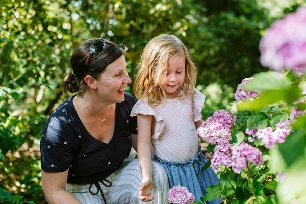 people on a walk through the gardens