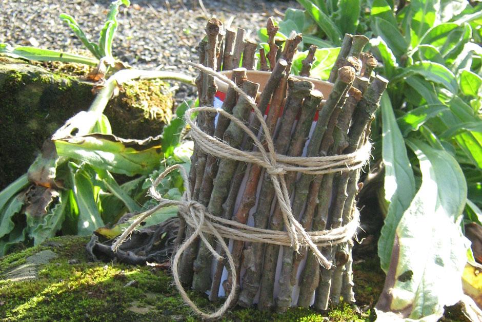 Make a pencil holder using twigs