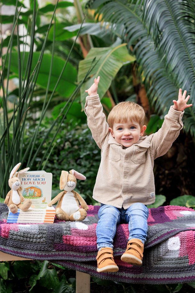 Boy with Guess How Much I Love You books