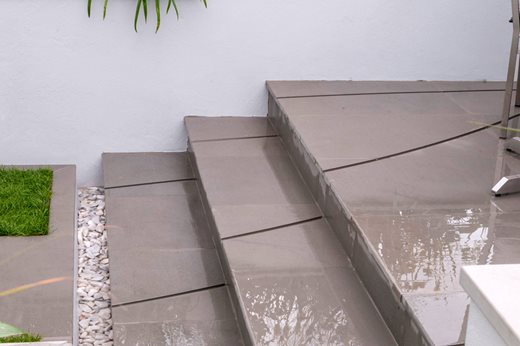 Sandstone steps featuring curved grooves