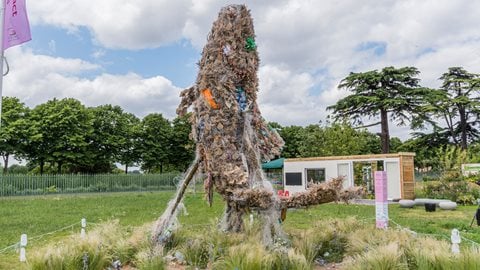 A fish-shaped structure made from old fishing nets, milk cartons and plastic bags emerges from the centre of the design, communicating a hard-hitting message about the impact of plastic on our seas