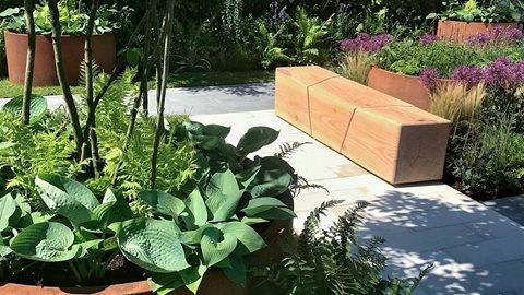 A garden that explores the juxtaposition between inspiring contemporary sculpture, naturalistic planting and a strong message.