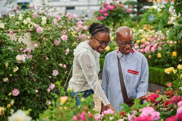 people on a walk through the gardens