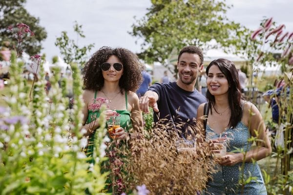 people on a walk through the gardens