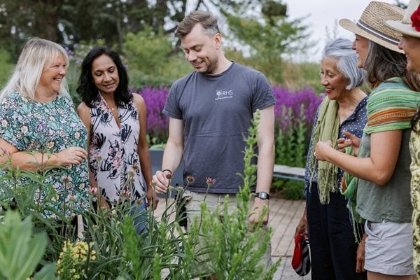 Two people having fun gardening