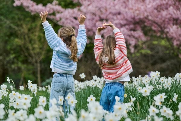 people on a walk through the gardens