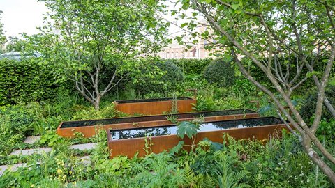 The water in the three long troughs forms patterns, rippling and jumping when the music is switched on.