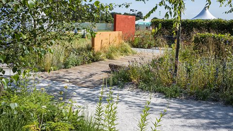 Three small walls took six days to build using traditional methods using just sand, water and lime and coloured with natural dyes