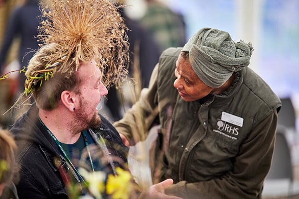 Two people having fun gardening